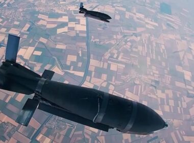 Glide bombs drop away from a Russian jet.
