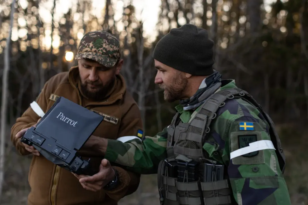 Swedish and Ukrainian drone operators look at the video feed from a reconnaissance drone on Gotland Island during Exercise Aurora 26 in Sweden. Ukraine's Armed Forces sent drone operators to pass on lessons learned to their NATO counterparts and to act as a challenging opposing force for Allied soldiers. More than 18,000 soldiers from 13 countries took part. (Photo: NATO)