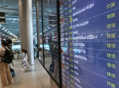 Flight information board displaying arrivals and departures at Domodedovo Airport in Moscow, Russia. Photo: TASS
